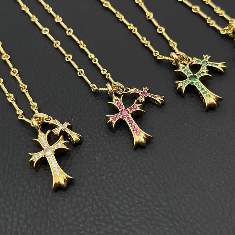 Chrome Hearts Gold Cross Pendant with Gemstones